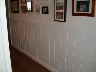 Muebles Rabanal pared con cuadros